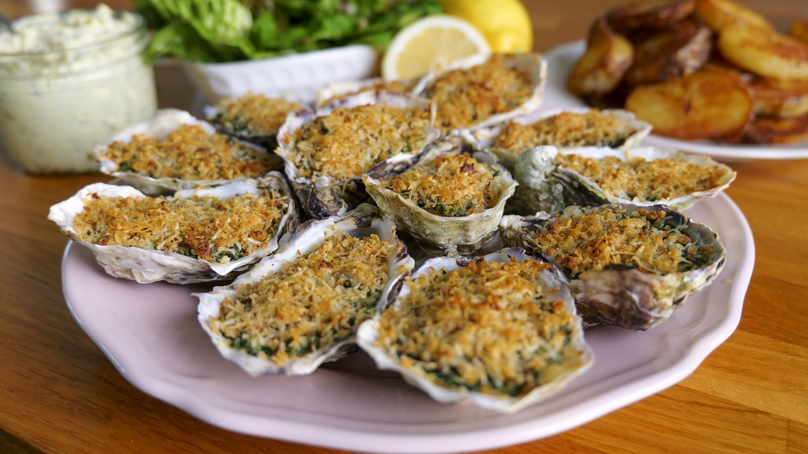 Baked oysters with sautéed potatoes and seaweed salad