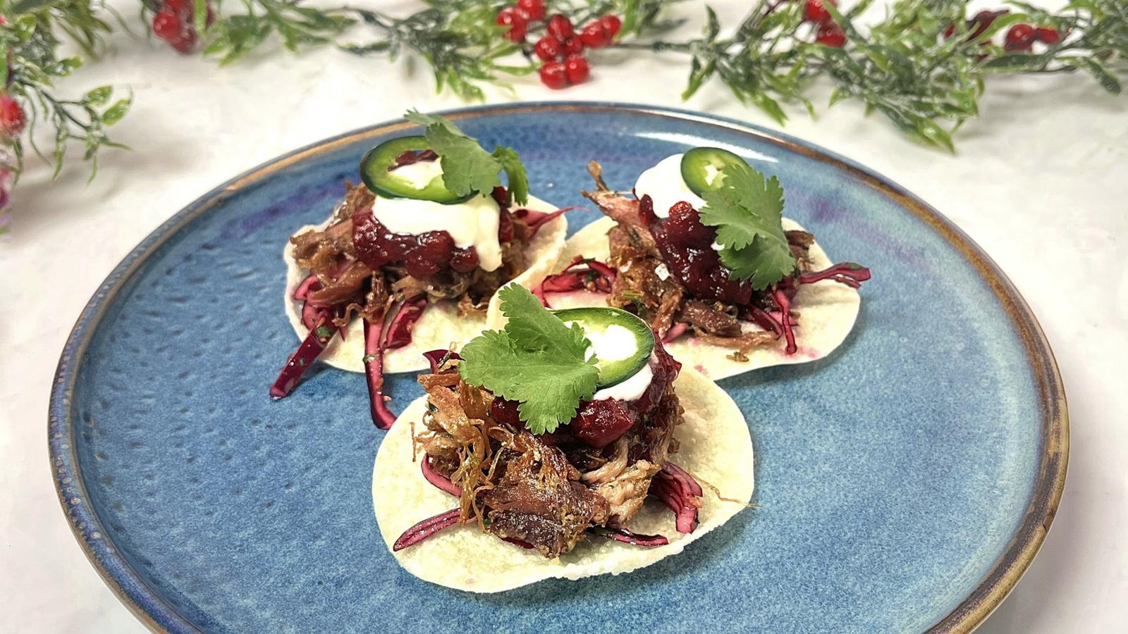 Deep-fried crispy tacos with duck confit and relish