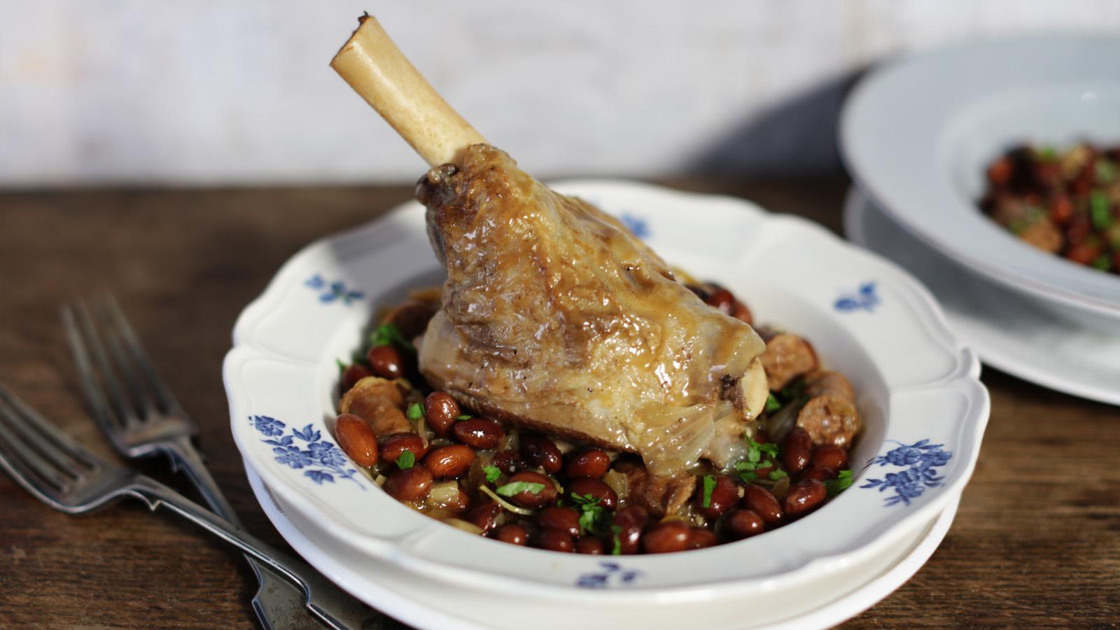 Braised lamb shank with bay and borlotti beans