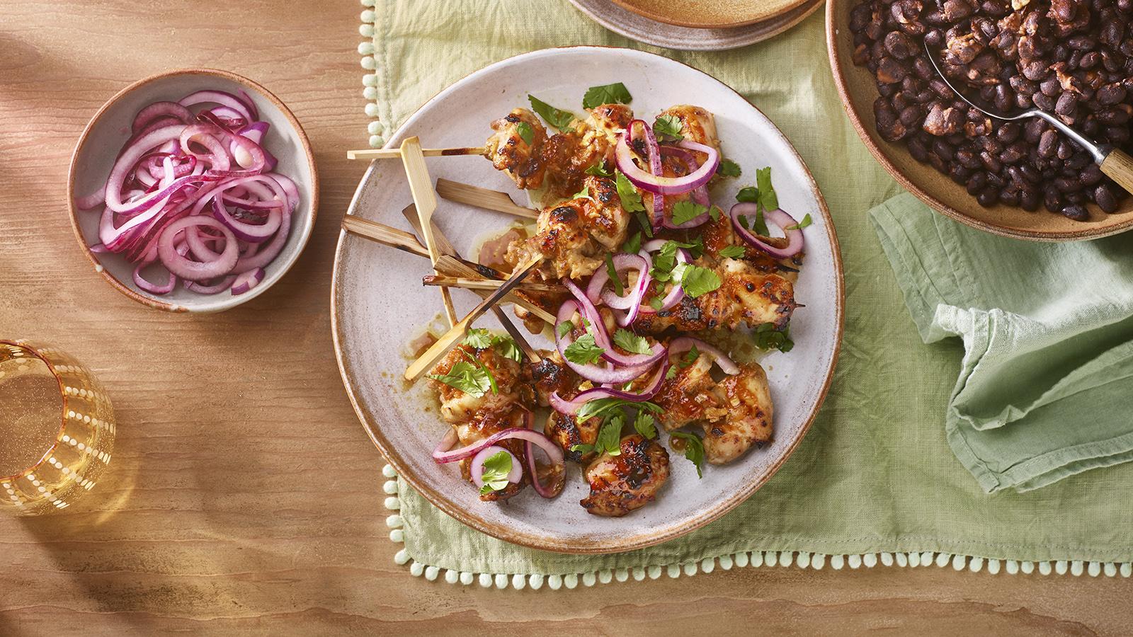 Burnt lime and honey chicken kebabs with black beans