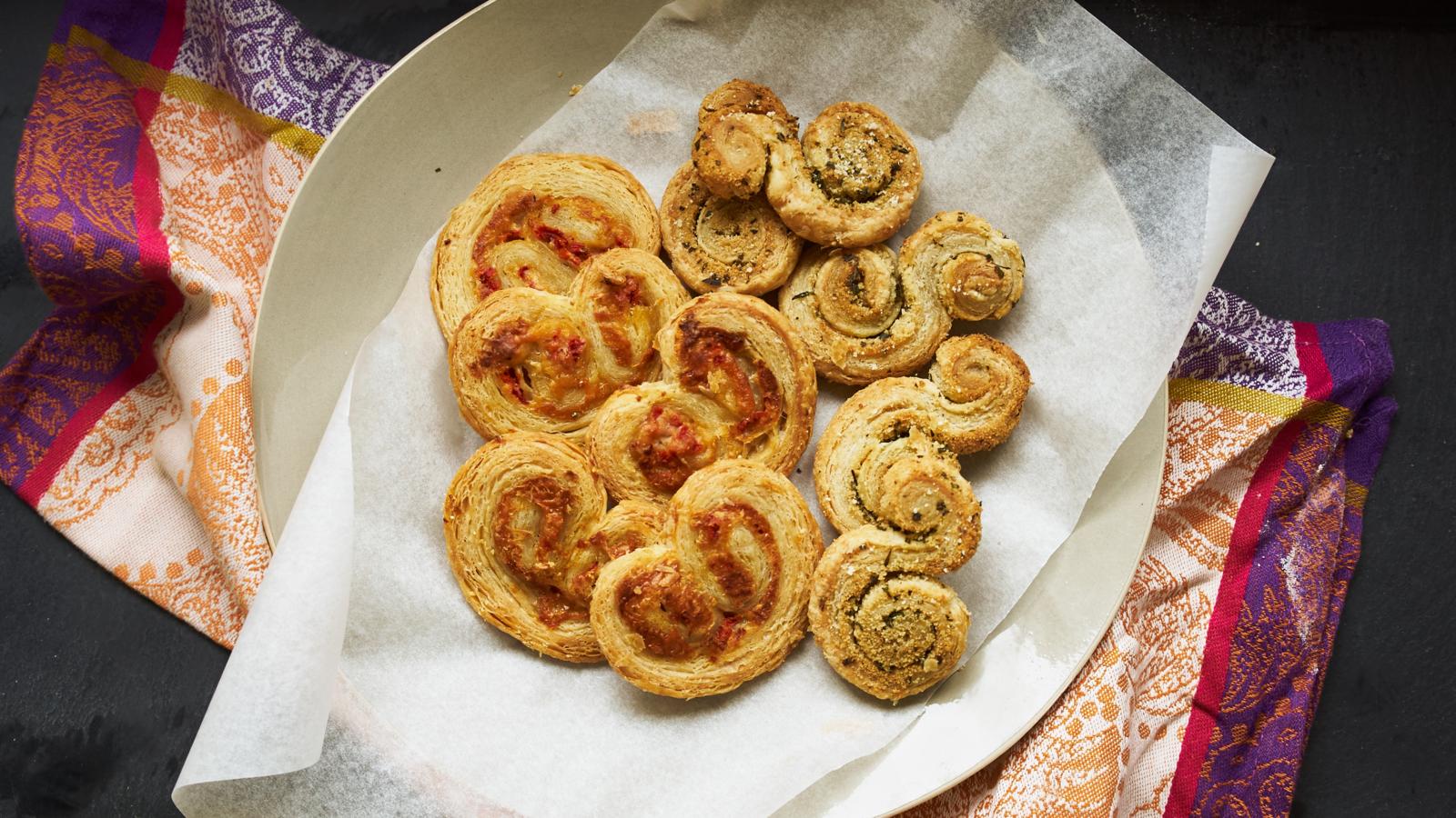 Herby puff twists and pepper and goats’ cheese palmiers