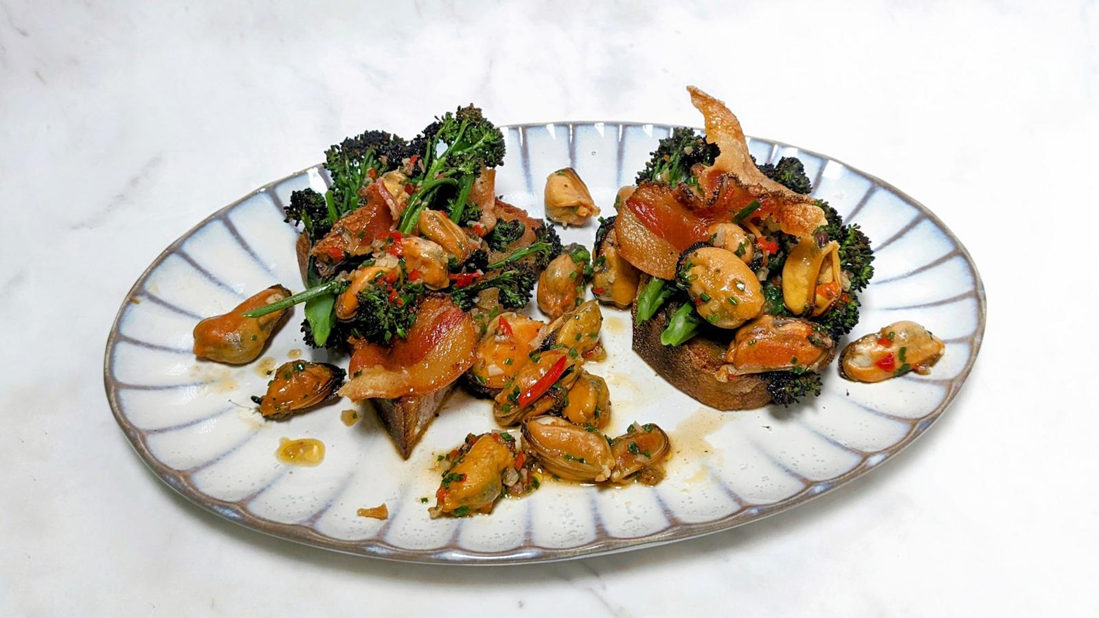 Purple sprouting broccoli, guanciale and mussels on sourdough