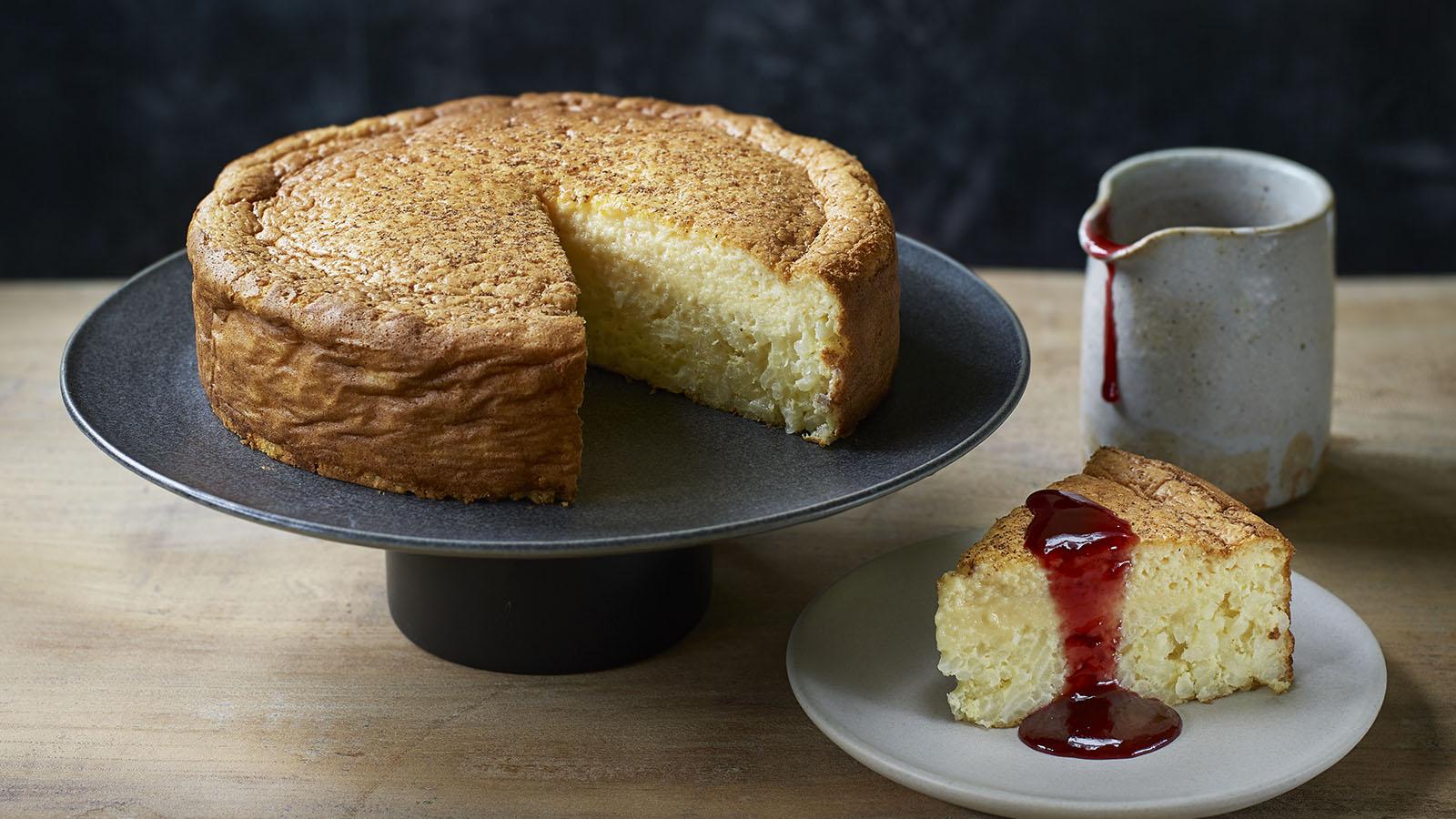 Rice pudding cake with raspberry jam sauce